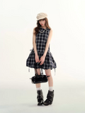 Sleeveless checked peplum dress with lace trim