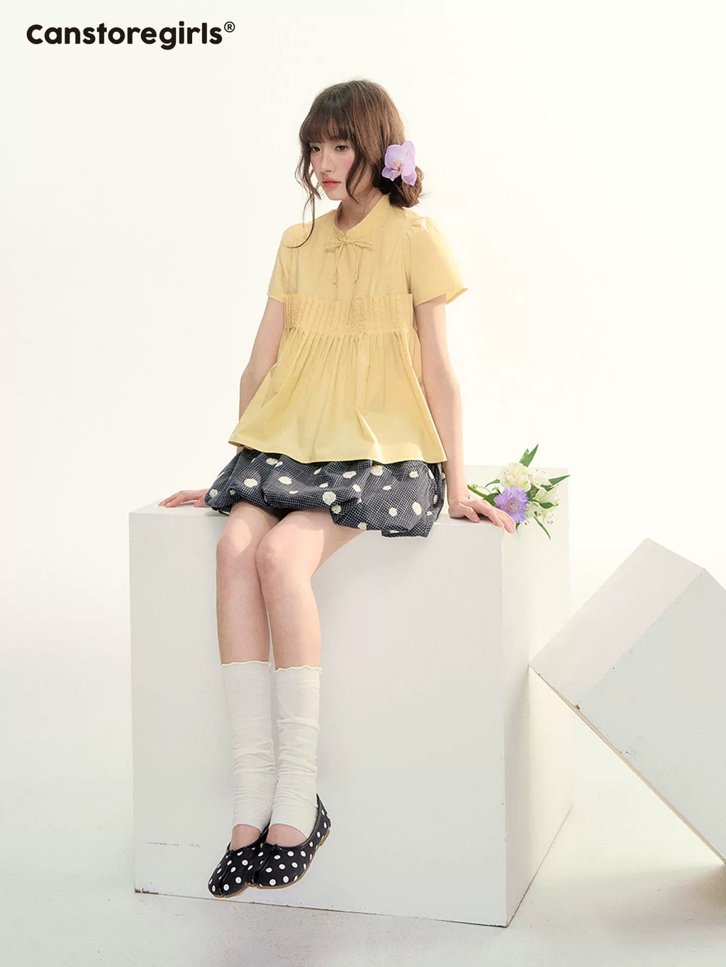 Yellow pleated short sleeve shirt