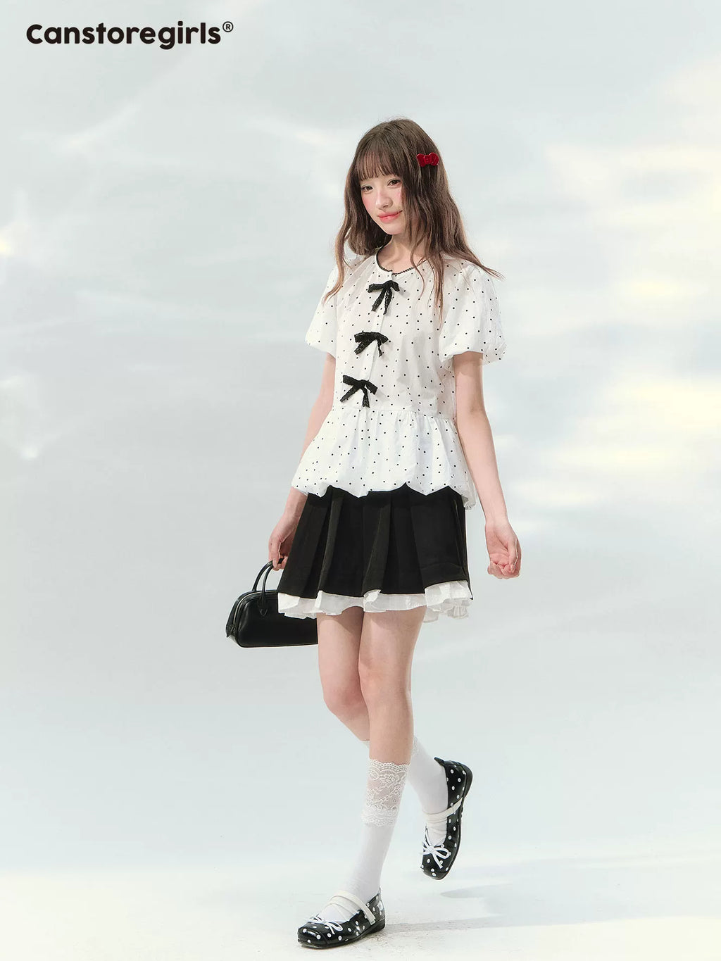 Polka dot puff sleeve cropped top with ribbon details