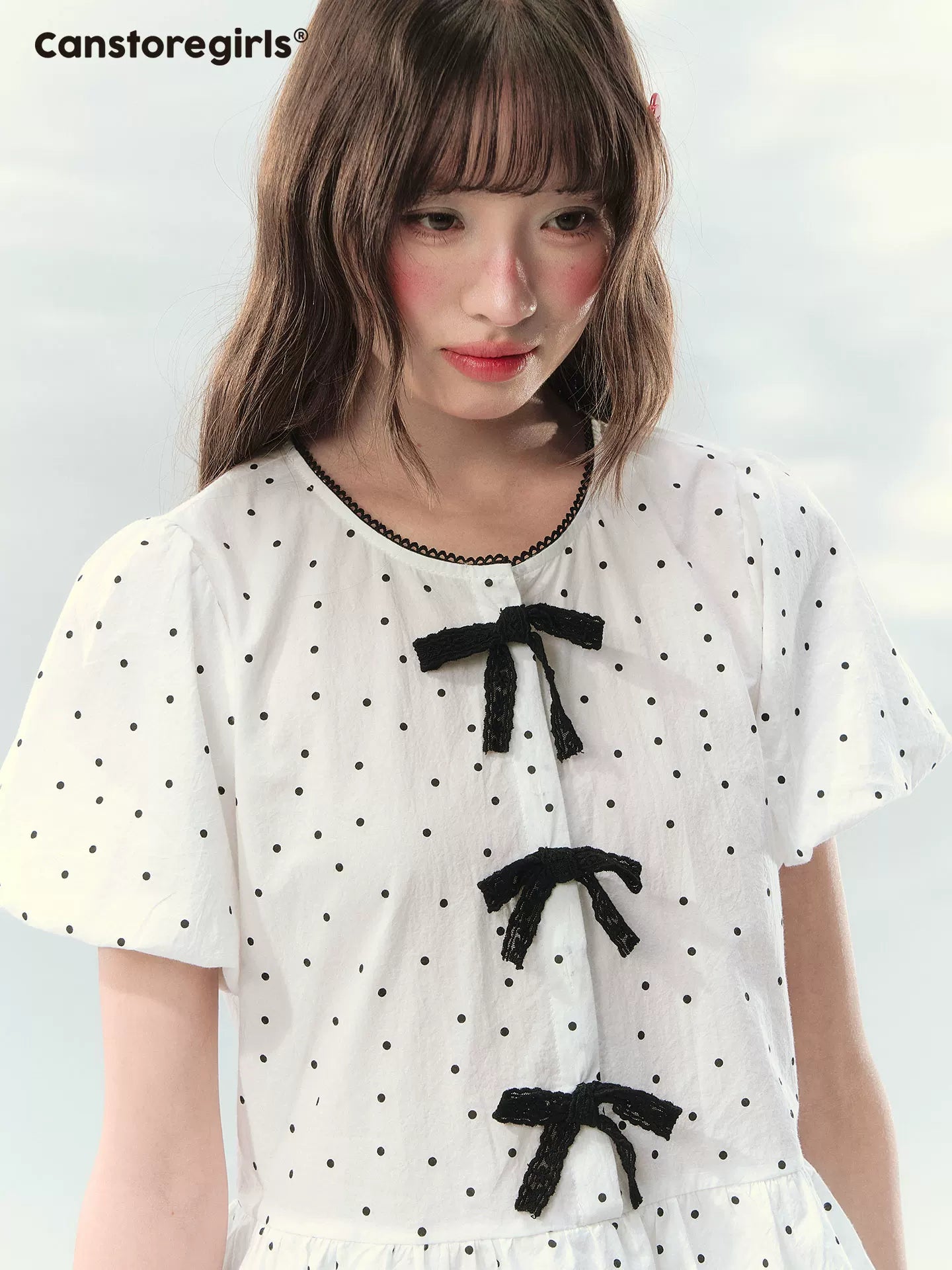 Polka dot puff sleeve cropped top with ribbon details
