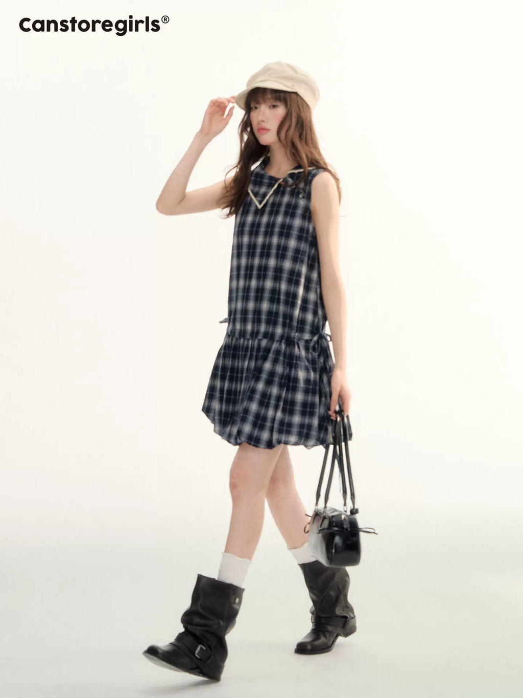 Sleeveless checked peplum dress with lace trim