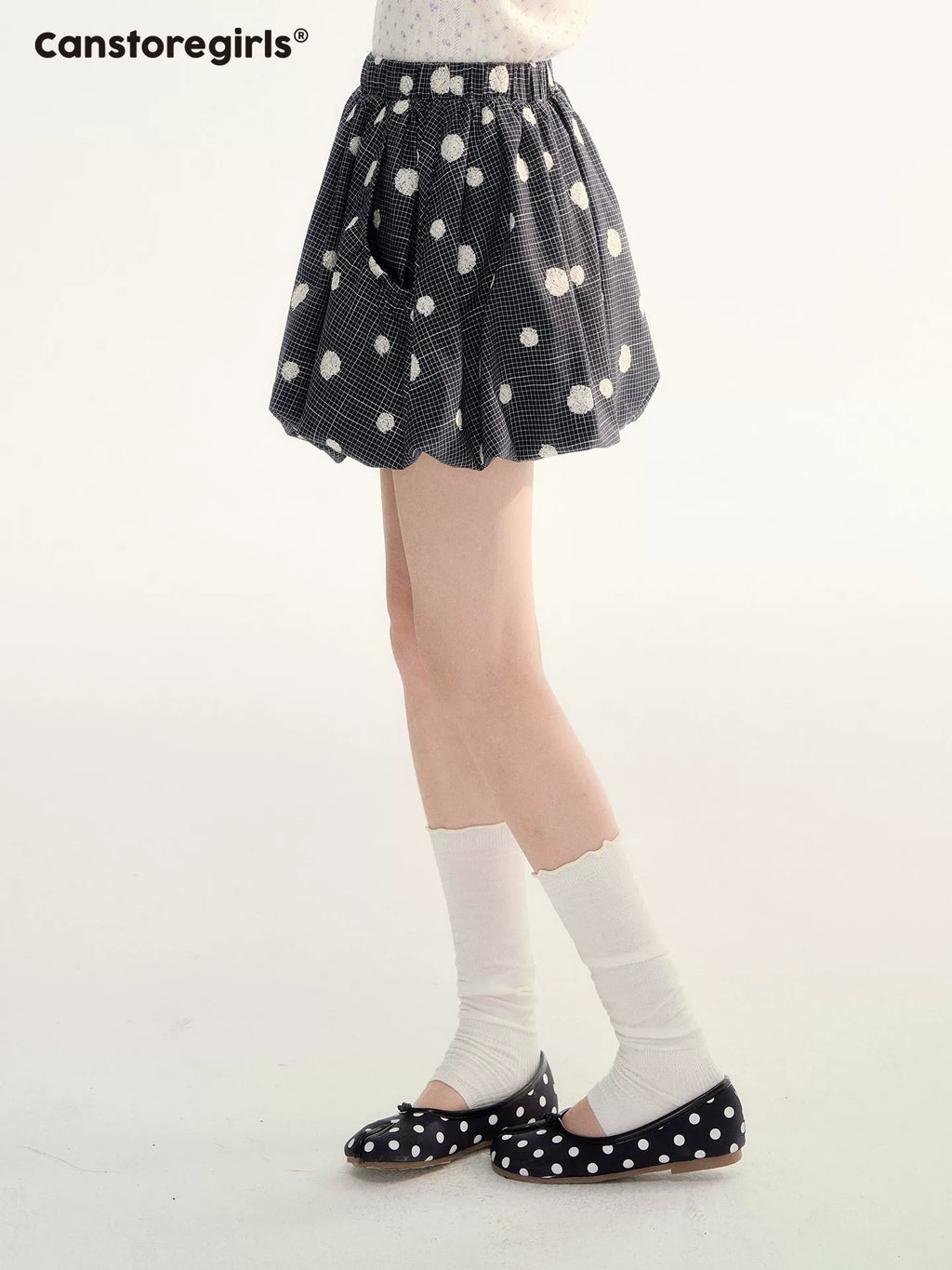 Flocked polka dot pleated skirt