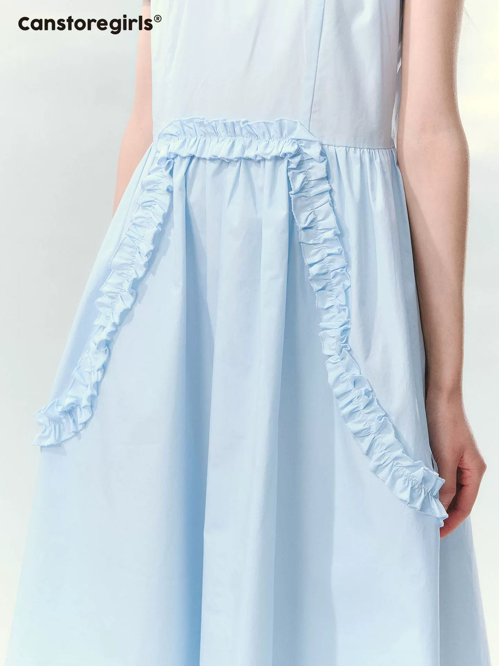 Blue ruffled dress with puff sleeves and waist detail