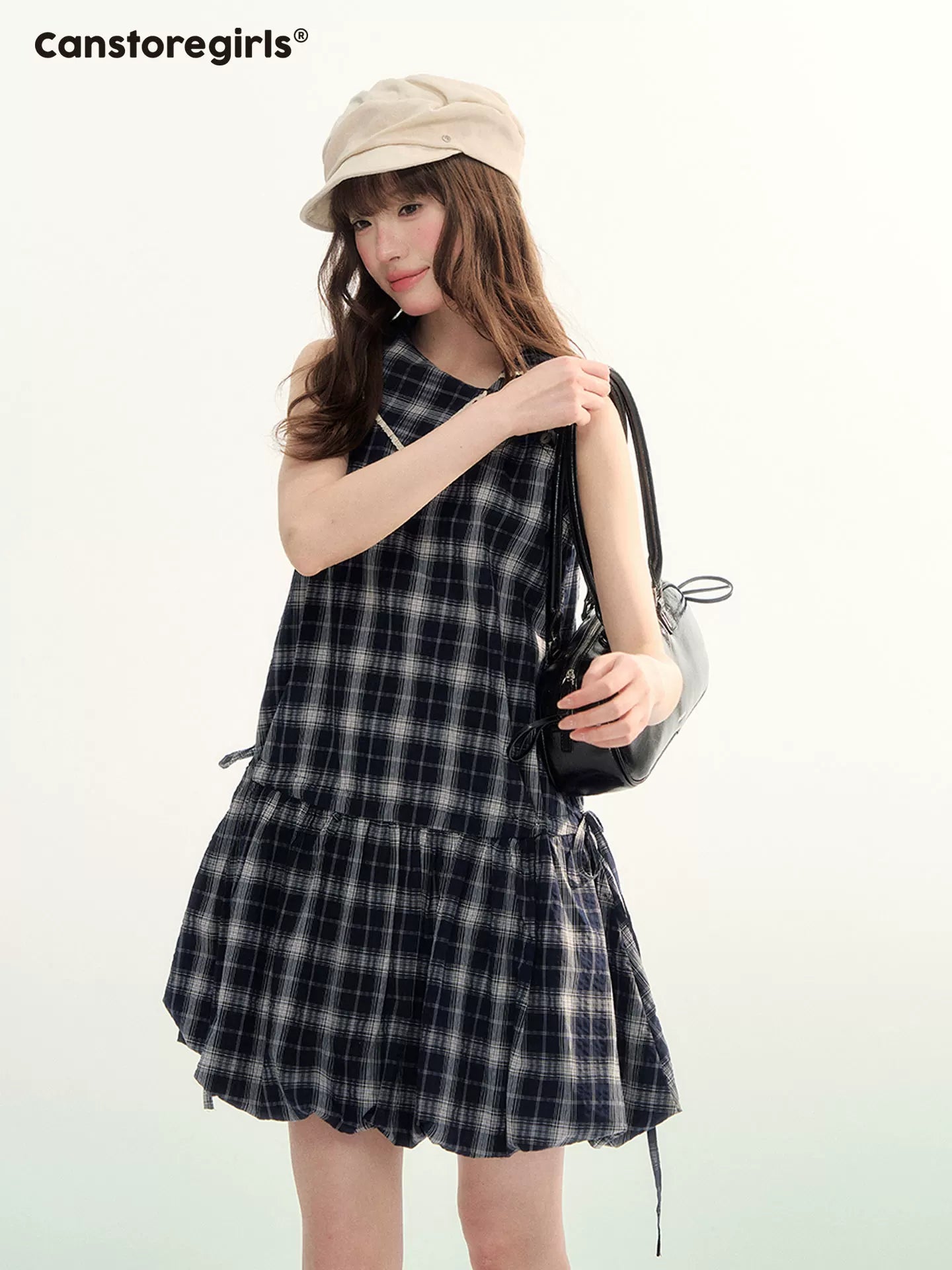 レーストリム付きチェック柄ペプラムスリーブレスドレス